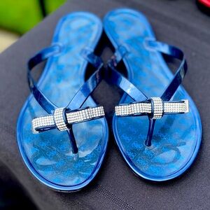 Jelly flip flops with crystal bow.  Size 7